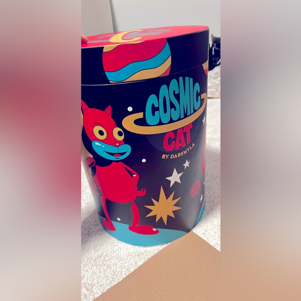 The Cosmic Cat Red 12" Vinyl Figure is alimited collectible(DABSMYLAxBYNDDASTRT)